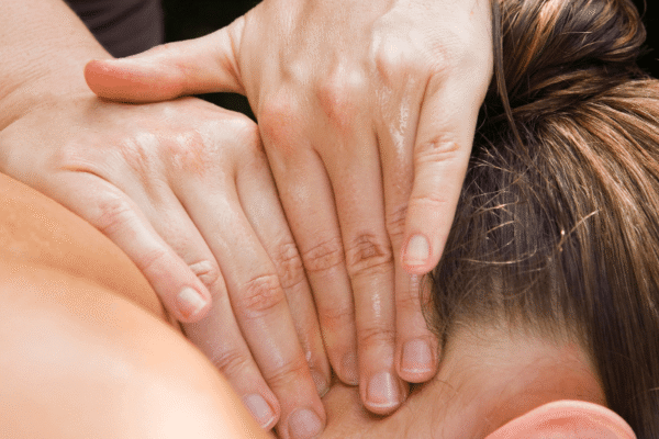 Rejuvenating with Swedish Massage in Tysons Corner Close-up of a Swedish Massage Tysons Corner neck and shoulder massage for deep relaxation.